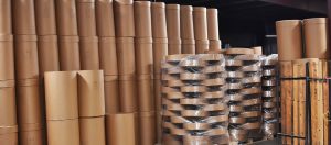 fibre barrels with plastic wrap ready to ship to customers The Master Package Fibre Shipping Containers