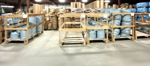 warehouse with steel bands ready to be put on barrels at The Master Package Fibre Shipping Containers