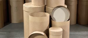 close up view of various sizes of fibre drums and lids customers can choose from The Master Package Fibre Shipping Containers
