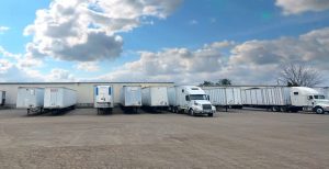 trucks getting fibre barrels loaded up ready for travel in Wisconsin The Master Package Fibre Shipping Containers