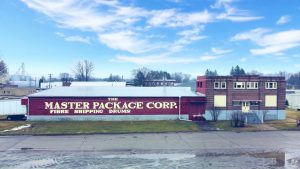 The Master Package Fibre Shipping Container and drums building and warehouse in Wisconsin on a sunny day