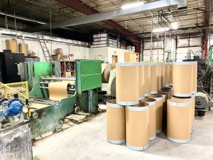 The Master Package Fibre Shipping Containers finished product near manufacturing equipment