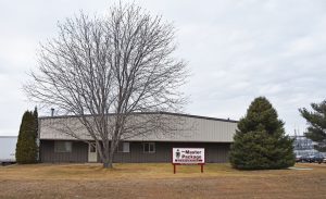 The Master Package Fibre Shipping Container facility with signage on a cool winter day