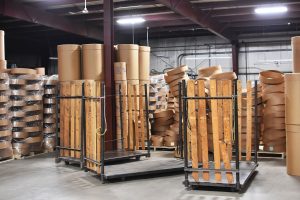 pallets and finished fibre shipping containers getting ready to assemble The Master Package Fibre Shipping Containers