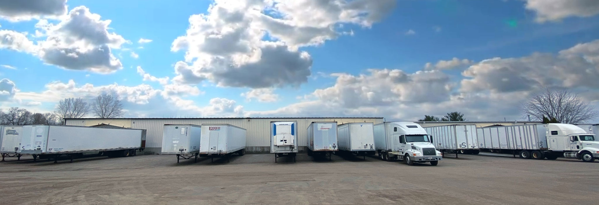 trucks getting fibre barrels loaded up ready for travel in Wisconsin The Master Package Fibre Shipping Containers